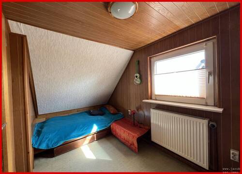 Zimmer im Dachgeschoss - 