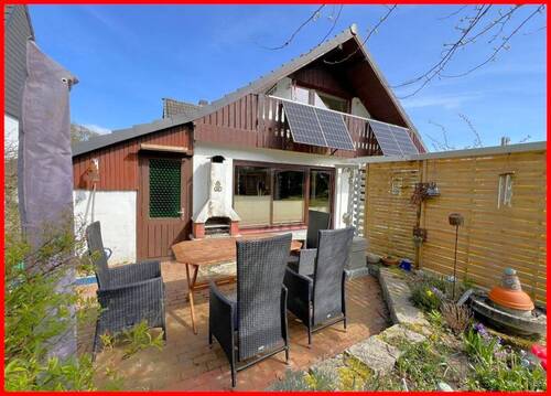 Ansicht mit Südterrasse - Einfamilienhaus mit 140,00 m&sup2; in Schleswig zum Kaufen