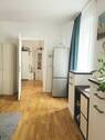 Wohnzimmer mit Blick ins zweite Zimmer 2. OG - 