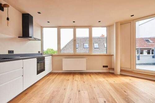 Wohnbereich mit offener Küche - 1 Zimmer Etagenwohnung zur Miete in Bremen