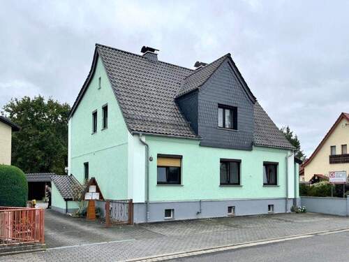 1 Ansicht Straßenseite - Idyllisch wohnen mit Einbauküche