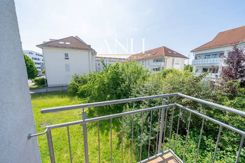 Wohn- und Geschäftshaus in Senden - 1. OG 4 Zimmer Wohnung - Balkon Schlafzimmer 1 - 