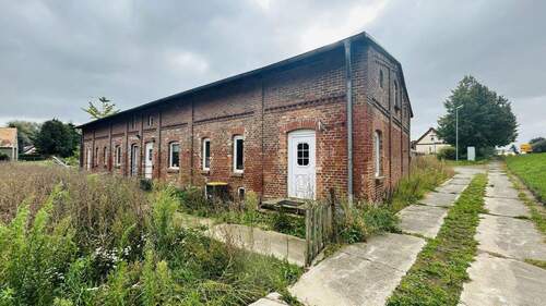 Außenansicht - Mehrfamilienhaus, Wohnhaus zum Kaufen in Dahmen