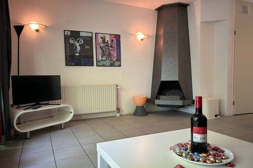 Wohn- und Esszimmer mit Kaminofen - 