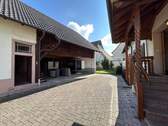 Anbau Schopf mit Blick Innenhof - 4 Zimmer Einfamilienhaus zum Kaufen in Forchheim