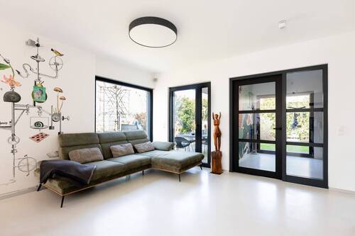 Wohnzimmer - 6 Zimmer Einfamilienhaus zum Kaufen in Leipzig