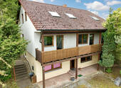 Vorderansicht von der Straße - 8 Zimmer Mehrfamilienhaus, Wohnhaus zum Kaufen in Wertheim / Bestenheider Höhe