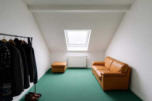 Zimmer im Dachgeschoss - 