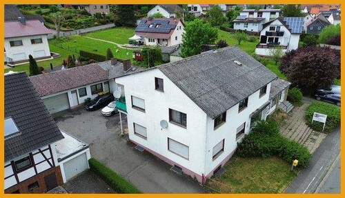 Seitenansicht - 6 Zimmer Mehrfamilienhaus, Wohnhaus in Wohratal