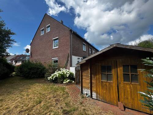 Haus Seitenansicht.jpg - 5 Zimmer Reihenendhaus in Bremen