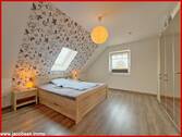 Schlafzimmer im Dachgeschoss - 