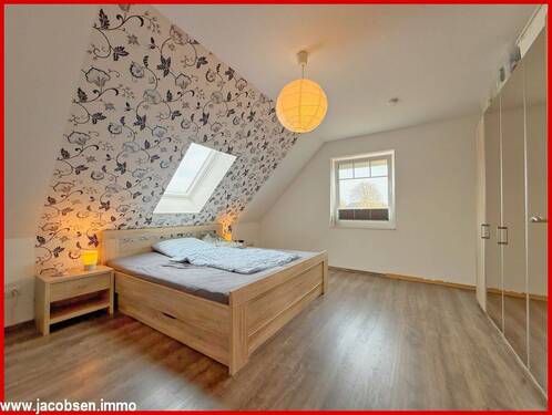 Schlafzimmer im Dachgeschoss - 