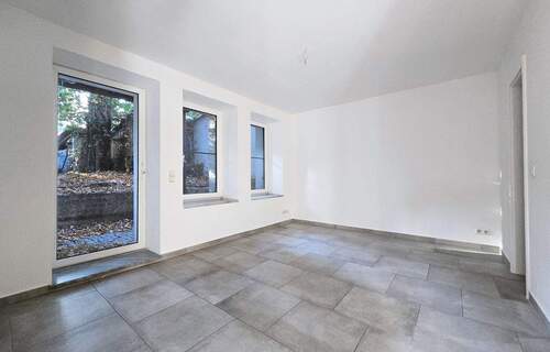 Zimmer - Gemütliche Souterrain-Wohnung mit Terrasse, Einbauküche und Fußbodenheizung