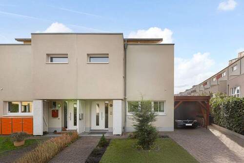 Frontansicht - Modernes und familienfreundliches Wohnen in energieeffizienter Doppelhaushälfte (Passivhaus)