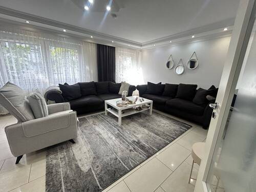 Wohnzimmer - Moderne 4,5-Zimmer-Wohnung in zentraler Lage