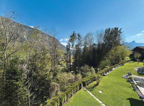 Ausblick vom Balkon DG nach Süden - Alpenflair trifft Entwicklungspotenzial - Mehrfamilienhaus in Unken sucht Visionär