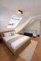 Schlafzimmer 1 im Dachgeschoss - 