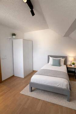 Schlafzimmer 2 im Dachgeschoss - 