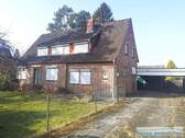 Ansicht von der Straße mit Carport (Nord-Ost) - Einfamilienhaus mit 135,00 m&sup2; in Lauenbrück zum Kaufen