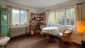 Charmanter Wohnraum mit Blick in den Garten - 