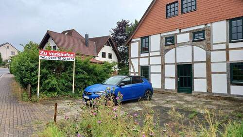 Haus vorn - Einfamilienhaus mit 140,00 m² in Buchholz zum Kaufen