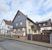 Hofreite mit zwei Wohnhäusern, Garten, viel Gestaltungspotenzial und 2 Garagen - Neu-Anspach