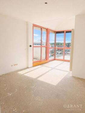 Wohnzimmer - Etagenwohnung mit 65,00 m&sup2; in Traunreut zum Kaufen