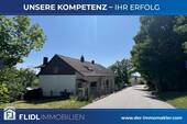 Bild 1 - Einfamilienhaus mit Einliegerwohnung und Wintergarten