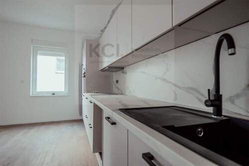 Küche - Exklusive Wohnung mit Wintergarten und Terrasse- Neubauqualität mit 3m Deckenhöhe & Einbauküche