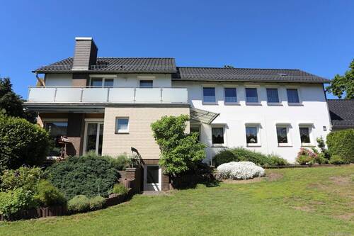 Außenansicht - Familienfreundliches Wohnhaus mit Nebengebäude auf großem Grundstück