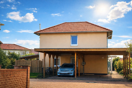 Blick auf das Carport - 4 Zimmer Etagenwohnung zum Kaufen in Wolfsburg