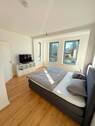 gemütliches Schlafzimmer - LUXUS in Elbnähe: Exklusive 2-Zi.-Whg. mit Balkon & Fußbodenheizung *Neubauniveau*