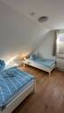 Ein Blick in einen Raum im Dachgeschoss - 