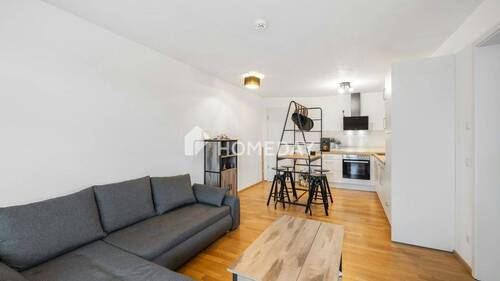 Wohnzimmer 2 - 2 Zimmer Etagenwohnung zum Kaufen in München