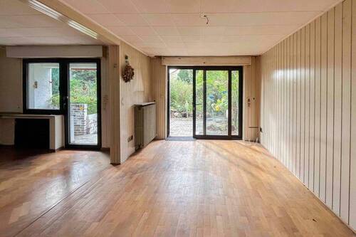 Wohnzimmer - 6 Zimmer Reihenendhaus zum Kaufen in Köln