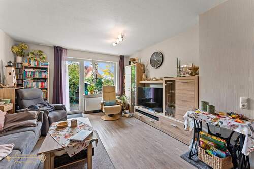 Wohnzimmer - Reihenmittelhaus mit 97,90 m² in Butjadingen zum Kaufen