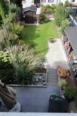 gemütlicher Garten.JPG - 6 Zimmer Reihenmittelhaus in Hannover