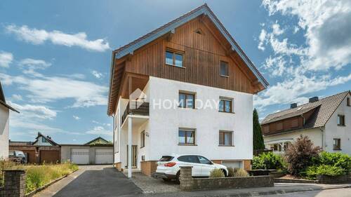 Außenansicht 1 - Charmantes Mehrfamilienhaus mit drei Wohneinheiten, modernisiert und vielseitig nutzbar