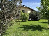 Ansicht und Garten - Geräumiges Ein- bis Zweifamilienhaus auf großem Grundstück in guter Lage!
