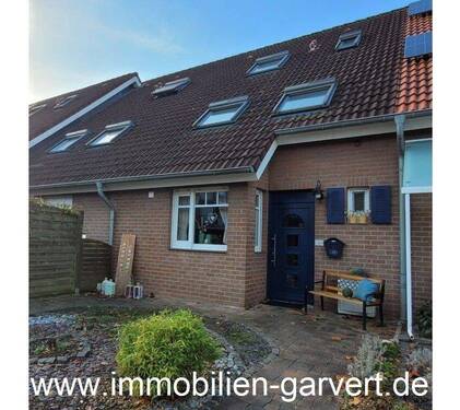 Ansicht - Familienplatz! Schönes Reihenmittelhaus mit Landhausflair, Garten und Carport, ruhig in Borken-Hovesath