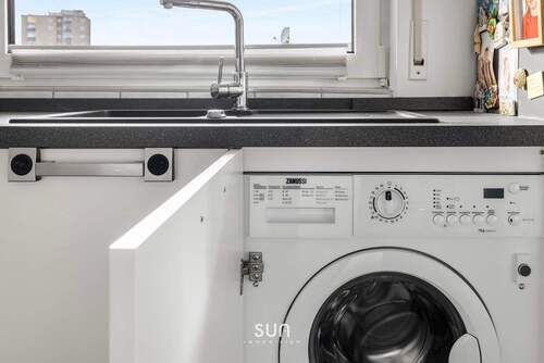 Waschmaschine in der Küche - 