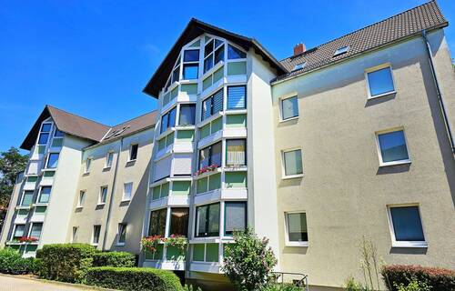 Wohnhaus - Attraktive Dachgeschosswohnung in beliebter Wohngegend mit EBK