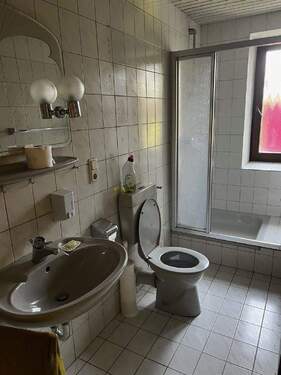 Wohnzimmer mit Kachelofen - 