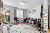 Wohnzimmer mit Ausgang Terrasse - Ein Zuhause zum Ankommen - für Menschen mit Herz und Zukunftsplänen