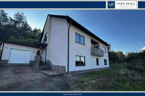 Titelbild - Familienfreundliches Zuhause mit großem Garten und Ausbaumöglichkeit