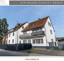 Wohnensemble in Dreieich: Zwei Mehrfamilienhäuser mit Garten und Stellplätzen