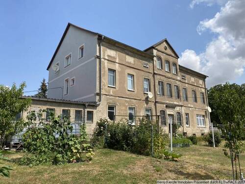 Ansicht Hauptgebäude 1 - 'Ländliche Ruhe in Wuhnitz bei Lommatzsch' - Teilweise vermietetes Mehrfamilienhaus mit Sanierungspotenzial