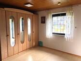 Schlafzimmer im Erdgeschoss - 