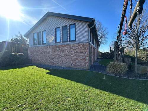 Stirnseite - 7 Zimmer Mehrfamilienhaus, Wohnhaus zum Kaufen in Wiemerstedt