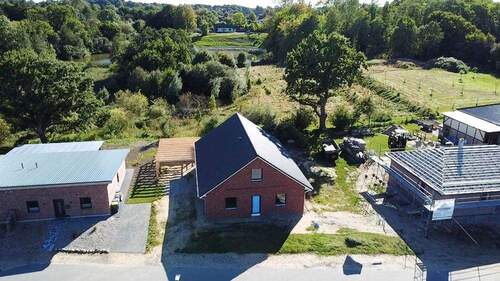 Luftbild - Bungalow mit 120,00 m² in Pahlen zum Kaufen